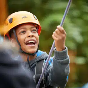 Young boy on a climbing activity session