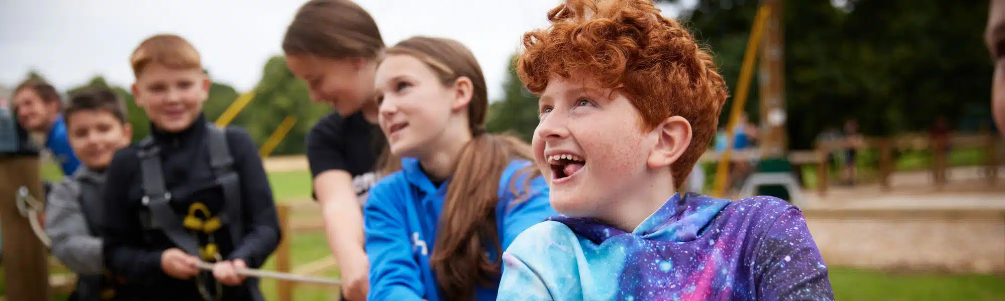 Children pulling on a rope
