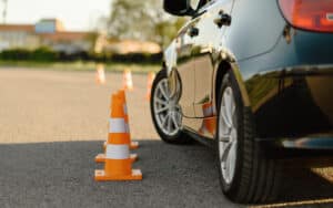 Car next to orange cones