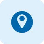 A blue map pin icon on a light blue background. The pin is within a blue circle and the image has rounded corners.
