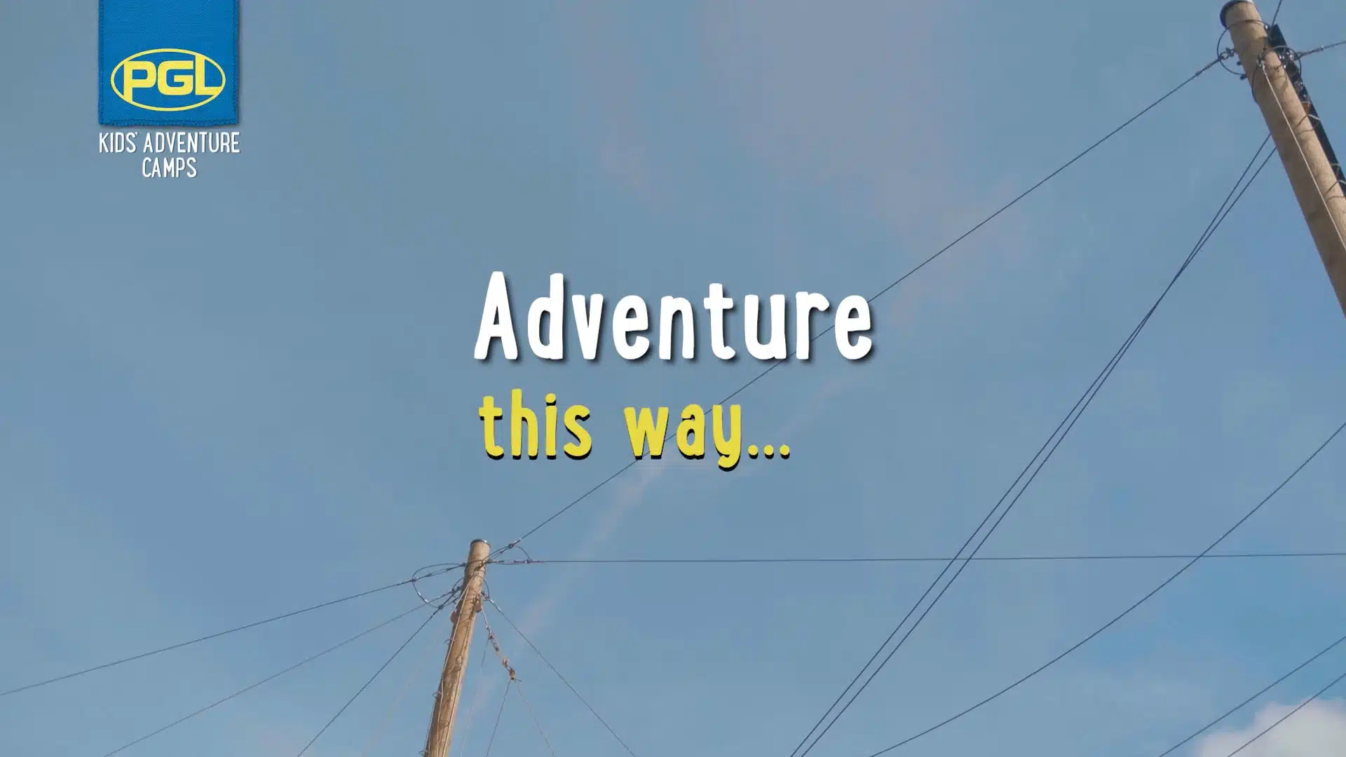 An advertisement for PGL Kids Adventure Camps. Text reads "Adventure this way..." against a blue sky