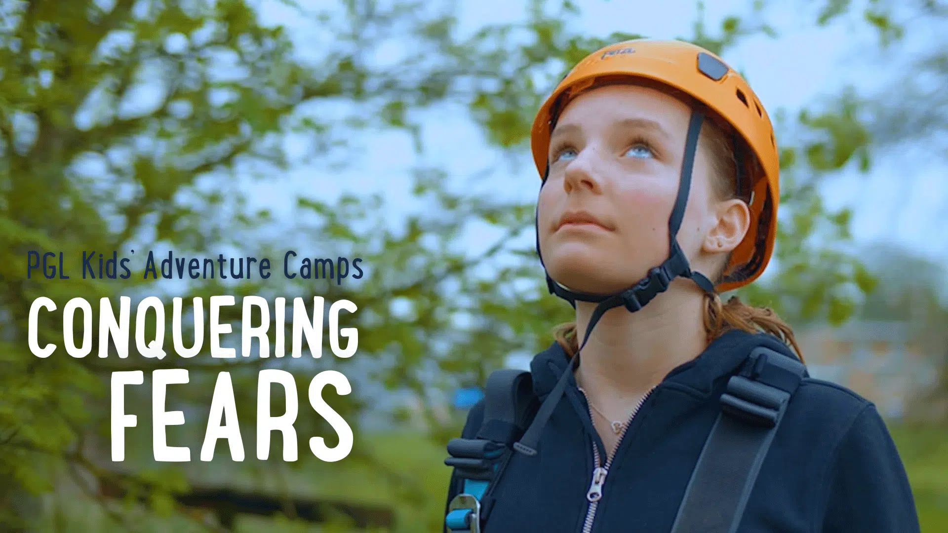 A child in outdoor gear and a helmet gazes upwards. Text reads, "PGL Kids Adventure Camps CONQUERING FEARS." Trees and nature are visible in the background.