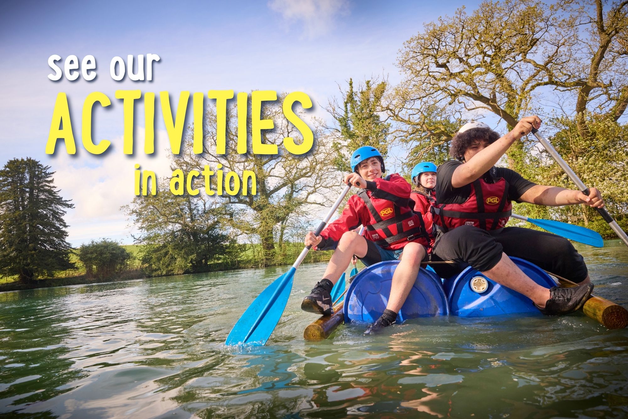 People in red life vests and blue helmets paddling a makeshift raft on a lake, with trees in the background. Text reads, "see our ACTIVITIES in action.