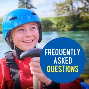 A smiling child wearing a blue helmet and red life vest holds a paddle near water; a blue circle reads "Frequently Asked Questions.