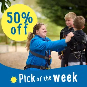A woman, wearing a blue jacket, helps two children in harnesses outdoors. A yellow circle reads "50% off." Text below says "Pick of the week.