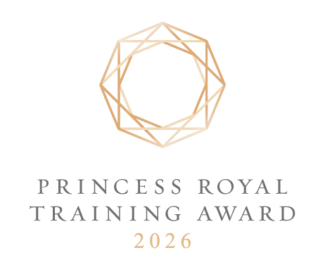 Princess Royal Training Award 2026 logo for PGL Adventure Holidays, featuring a geometric gold emblem above the text.